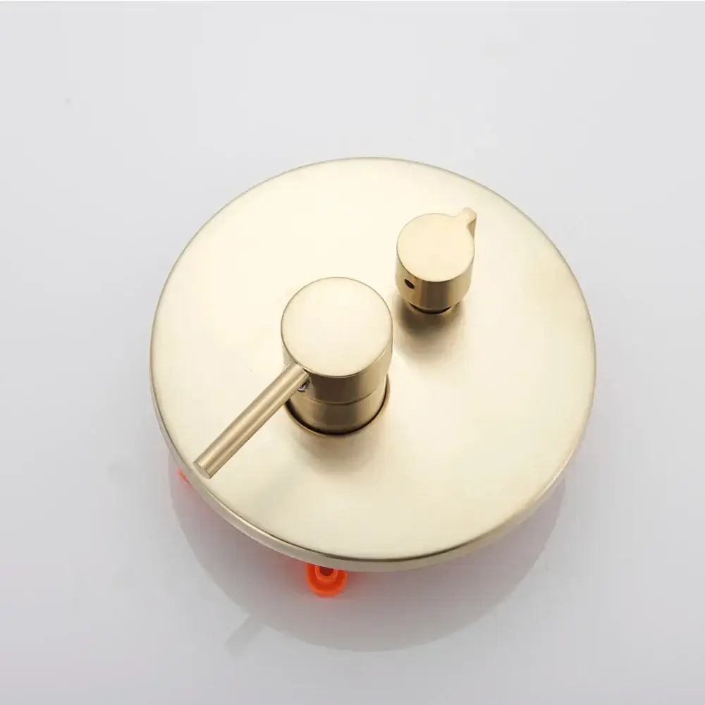 Modern brushed brass decorbites golden bathtub faucet with sleek circular base and two minimalist control knobs