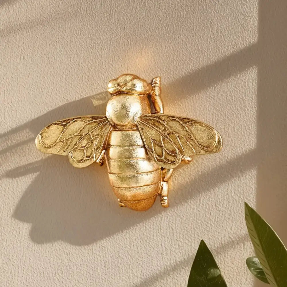 Golden bee resin wall hanger with detailed wings and segmented body for living room decorbites golden bee decor