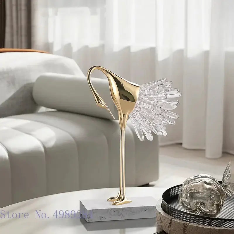 Golden bird agate marble crane statue with crystal feather detail on marble base for elegant home decor