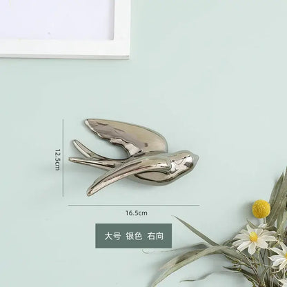 Silver swallow-shaped wall decor with sleek metallic finish 16.5cm wide 12.5cm tall from decorbites golden bird collection
