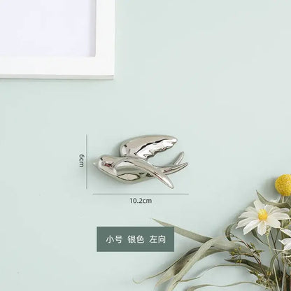 Silver swallow bird swallow sculpture wall decor by decorbites golden bird with sleek metallic finish 10.2cm by 6cm