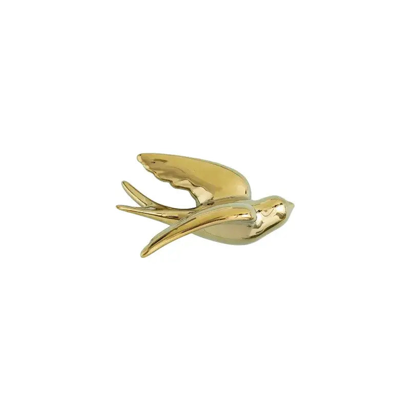 Golden bird swallow sculpture with sleek reflective surface and detailed wings for decorbites golden bird wall decor