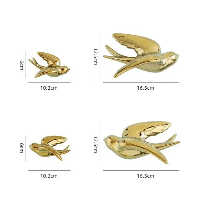 Decorbites golden bird swallow sculpture with smooth glossy gold surfaces and detailed wings for living room decor
