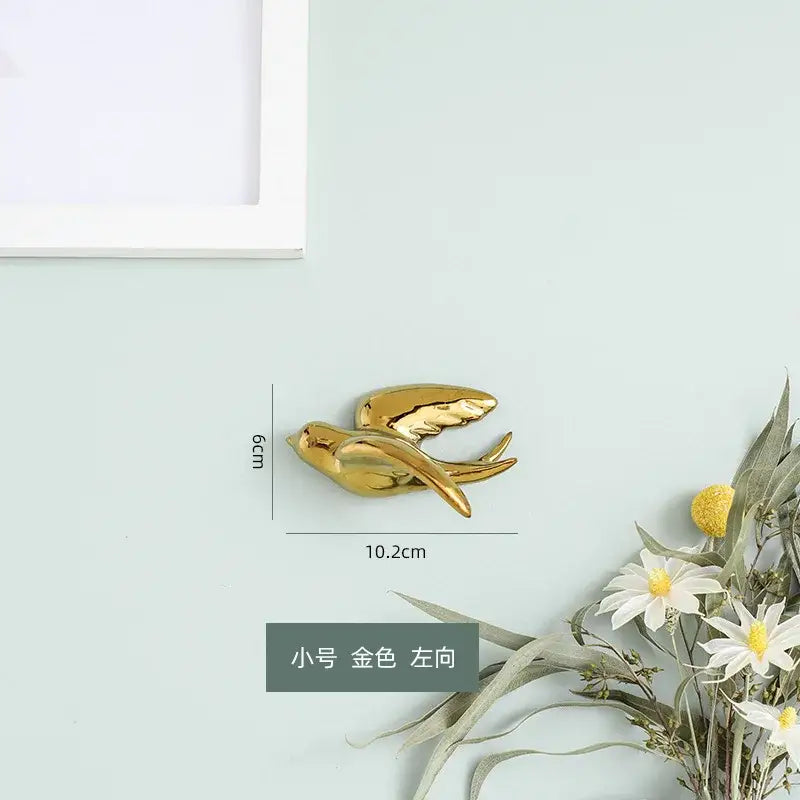 Decorbites golden bird swallow sculpture gold and silver wall decor with sleek metallic finish 10.2cm by 6cm