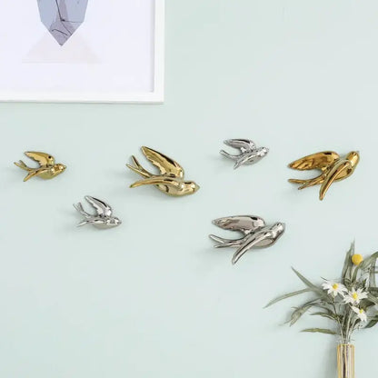 Gold and silver metallic bird swallow sculpture wall decor by decorbites for living room design accents