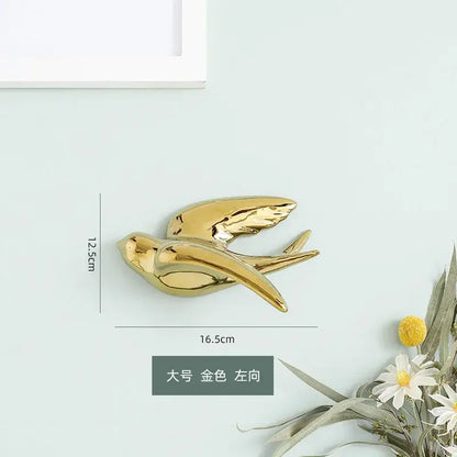 Golden bird swallow ceramic sculpture in gold with glossy finish 16.5cm wide for modern decorbites wall decor
