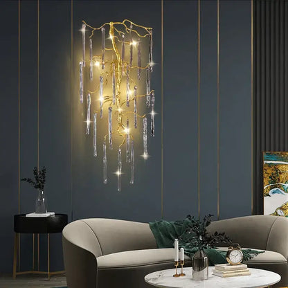 Golden branch crystal wall lamp with dangling icicle-like pendants in gold for elegant bedroom decorbites crystal wall lighting