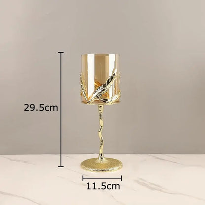 Golden branches candle holder with intricate leaf detailing on stem and base in metallic gold for dining room decorbites candle holders