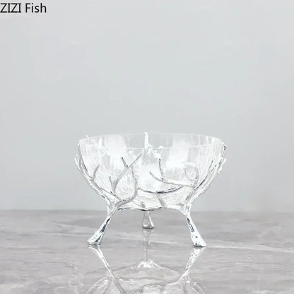 Clear glass bowl set with intricate silver golden branches legs and frosted textured interior decorbites golden branches decor