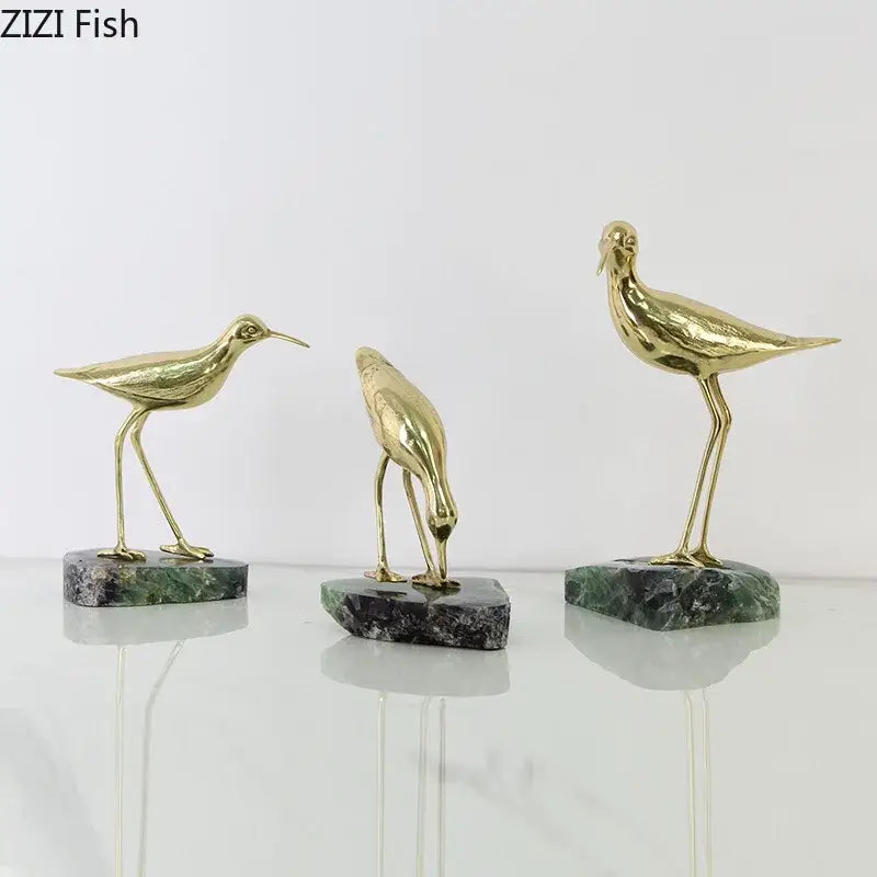 Three golden brass bird figurines on dark green marble base desk ornament for living room statues display