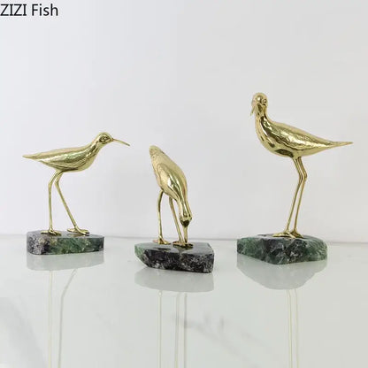 Three golden brass bird figurines on dark green marble base desk ornament for living room statues display