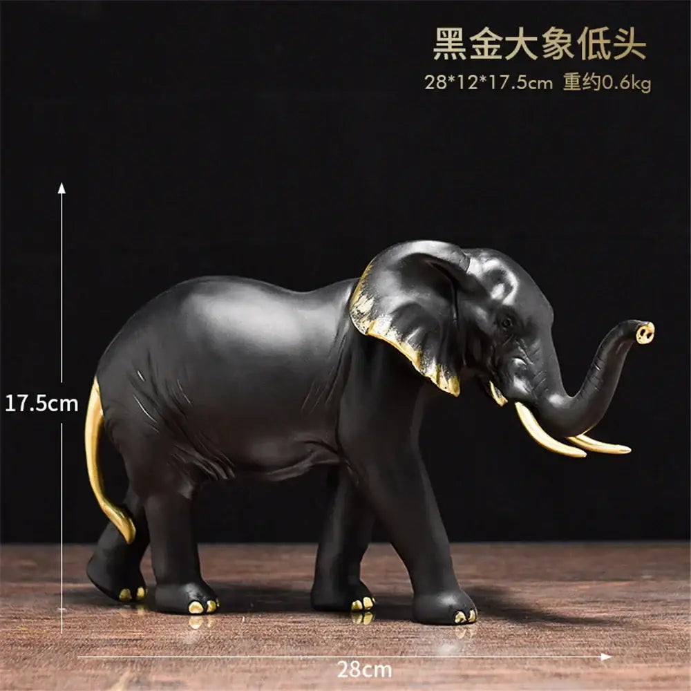 Black elephant resin sculpture with gold accents on ears trunk tip and feet for living room decorbites elephant resin decor