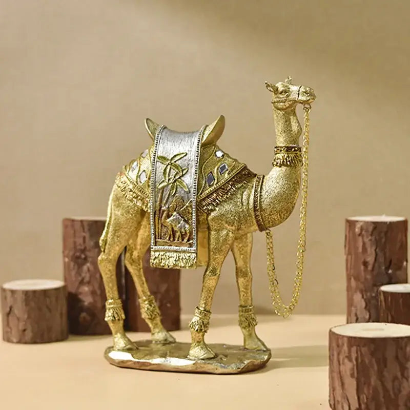 Golden camel resin sculpture with intricate silver and gemstone detailing from decorbites golden office decor set