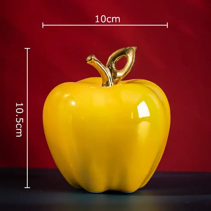 Vibrant yellow ceramic apple sculpture with polished gold stem 10cm wide 10.5cm tall for living room decor
