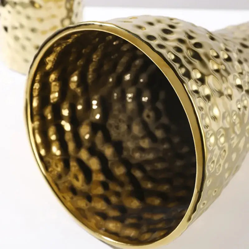 Golden ceramic geometric honeycomb vase with hammered textured surface and smooth inner rim for living room decorbites decor