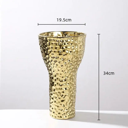 Golden ceramic geometric honeycomb vase with textured hammered surface and flared rim for living room decorbites decor