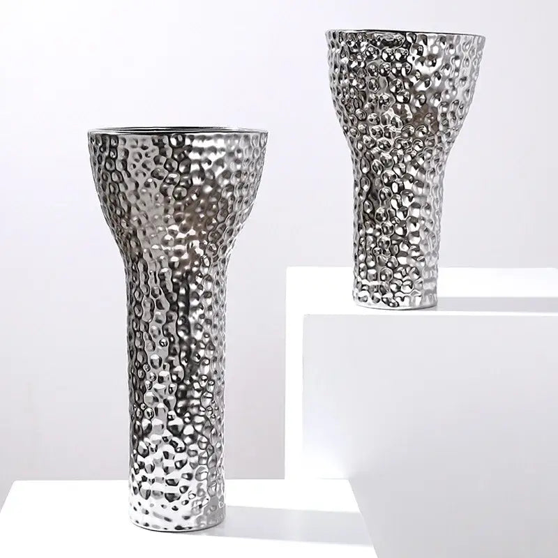 Silver hammered-textured ceramic vases with sleek modern design complement decorbites golden ceramic geometric honeycomb decor