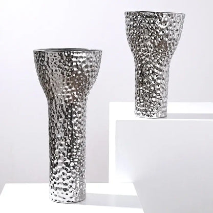 Silver hammered-textured ceramic vases with sleek modern design complement decorbites golden ceramic geometric honeycomb decor