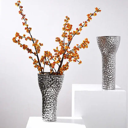 Silver textured ceramic vase with hammered pebbled surface and flared rim for decorbites golden ceramic geometric honeycomb decor