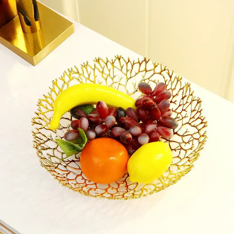 Golden metal tray fruit bowl with intricately woven coral shapes design by decorbites for dining room decor