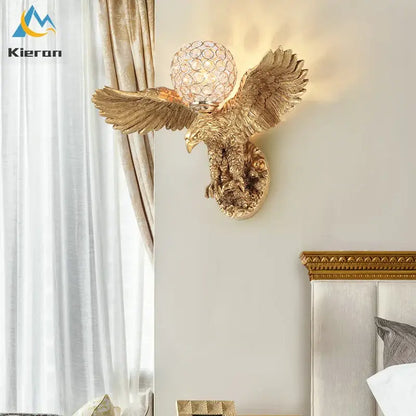 Golden crystal eagle wall lamp with crystal globe head and detailed feathered wings for living room decorbites crystal eagle