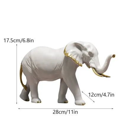 White ceramic elephant resin figurine with gold-trimmed ears tusks and feet for living room decor by decorbites elephant resin