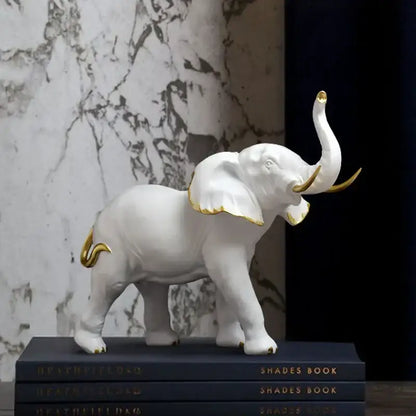 White ceramic elephant resin figurine with gold-trimmed ears tusks and tail for living room lucky decor by decorbites elephant resin
