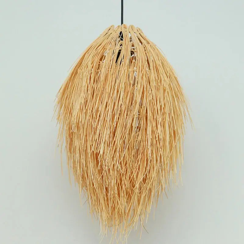 Golden feathery bamboo weave pendant lamp featuring natural light-brown woven straw strands for bedroom lighting