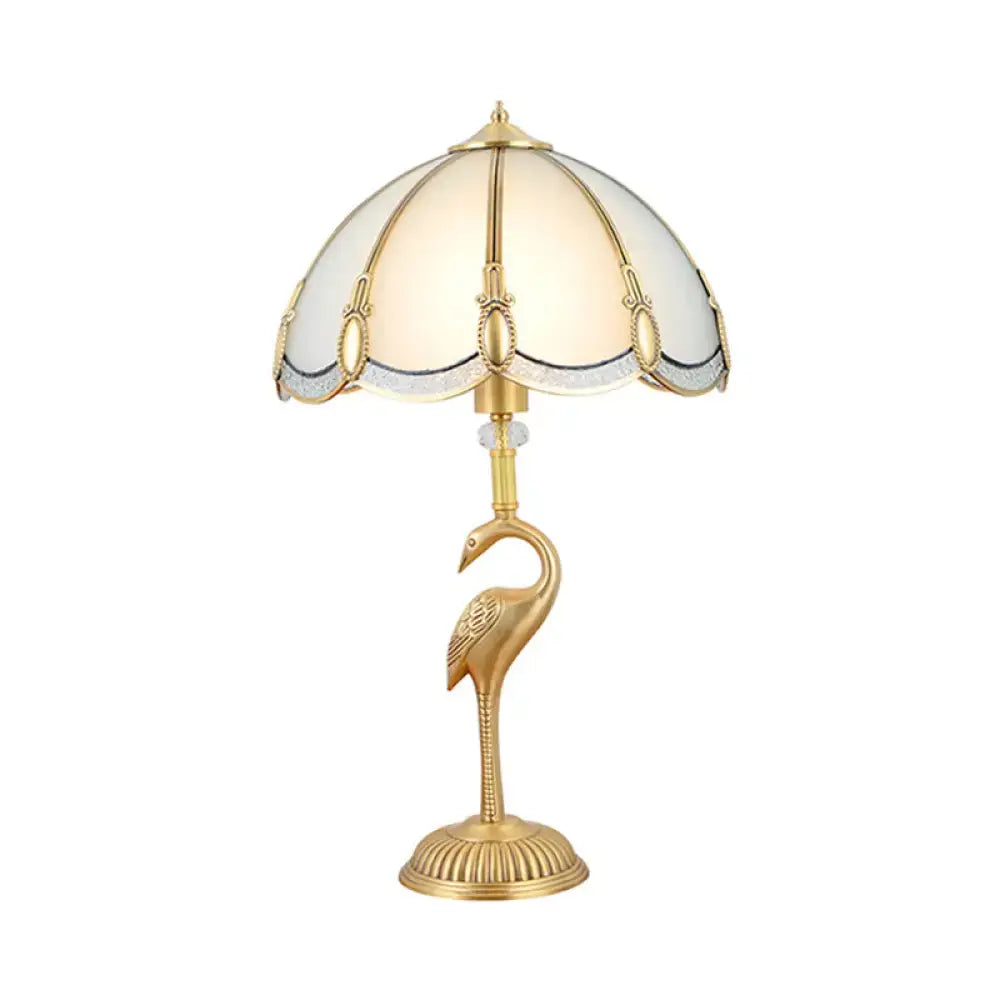 Golden flamingo-shaped table lamp with peacock feather beveled glass shade for living room nightstand lighting