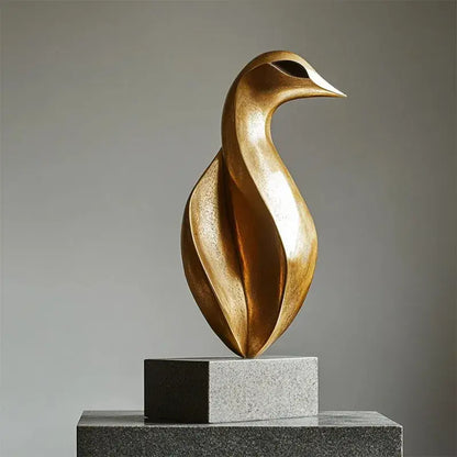 Golden geometric tree hole sculpture featuring a polished golden abstract bird with sleek flowing curves on volcanic rock decorbites golden geometric