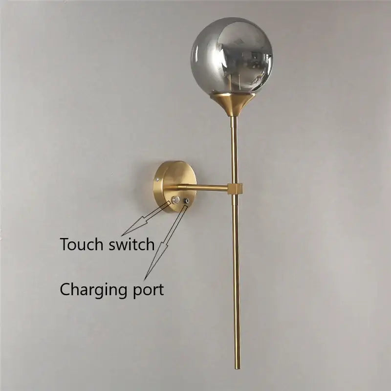 Modern brass wall sconce with a clear golden glass ball led globe for bedroom decorbites golden glass lighting