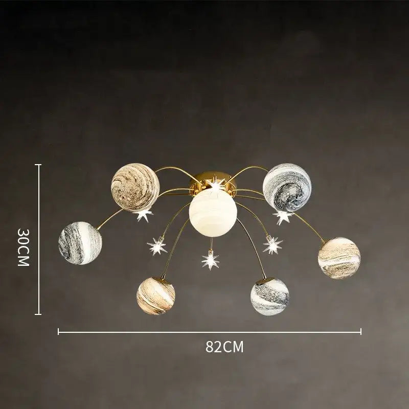 Gold-toned golden glass ball planet chandelier with six marbled glass ball globes for kids room and living room decor