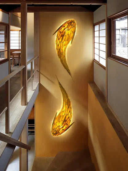 Golden handwoven bamboo led fish wall light with textured layered design for living room decor by decorbites