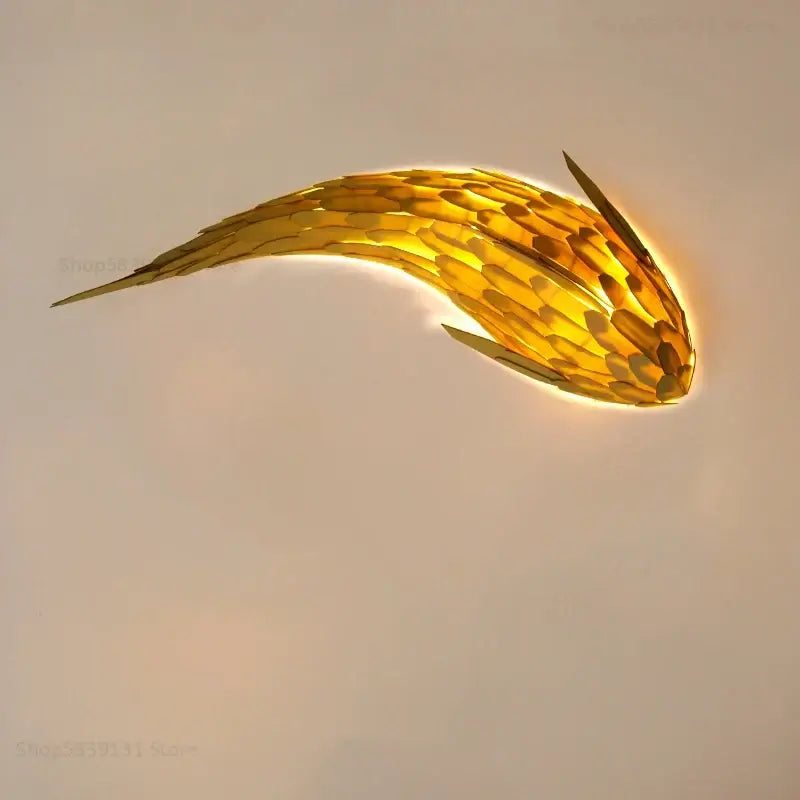 Golden handwoven bamboo led fish wall light with scale pattern and sleek metallic finish for living room decorbites wall light