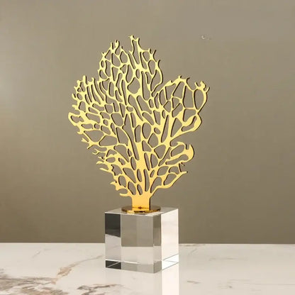 Golden hollow tree coral sculpture with a clear crystal base for elegant living room decor by decorbites golden hollow