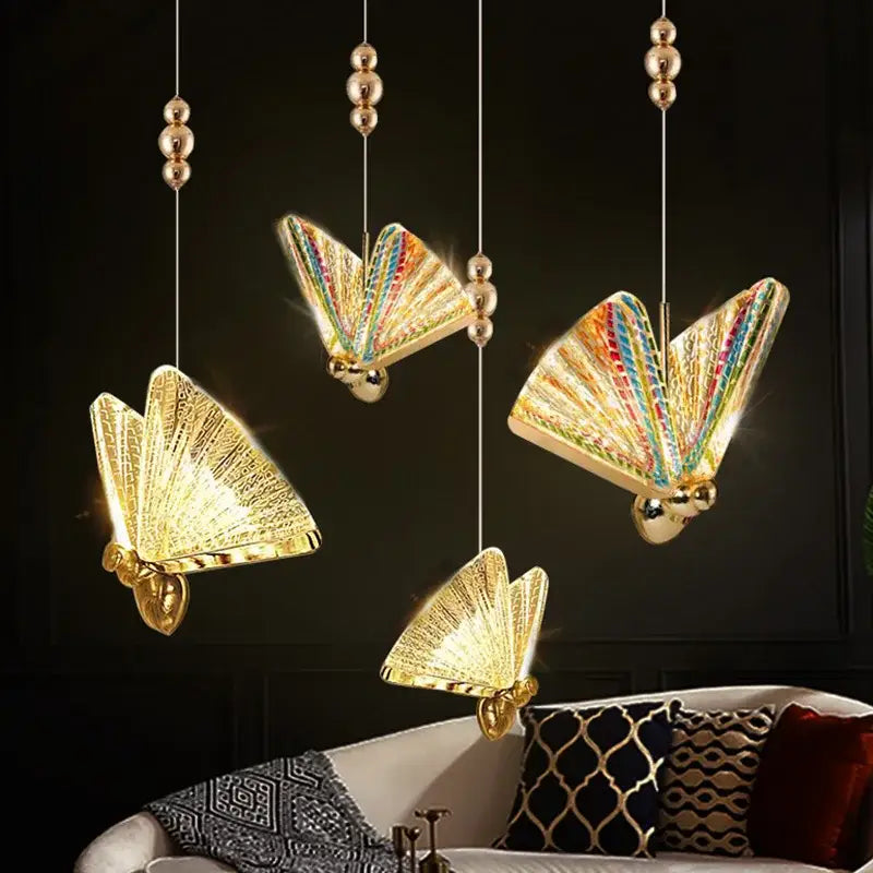 Golden iridescent butterfly pendant light with rainbow wings and metallic gold accents for living room decor