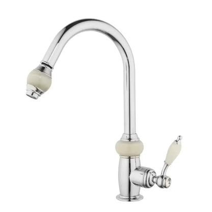 Chrome finished kitchen faucet with cream ceramic handles and spout accents featuring golden jade diamond handle design