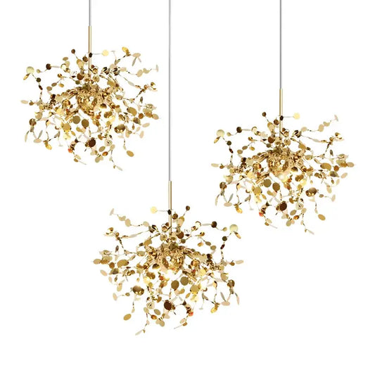 Three golden leaf pendant lights with intricate metallic branches and circular accents for dining room decorbites g9 leaf