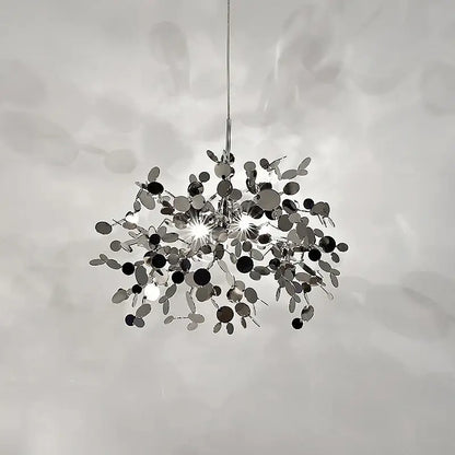 A modern chrome spherical pendant light with reflective discs for elegant dining room decorbites g9 leaf lighting