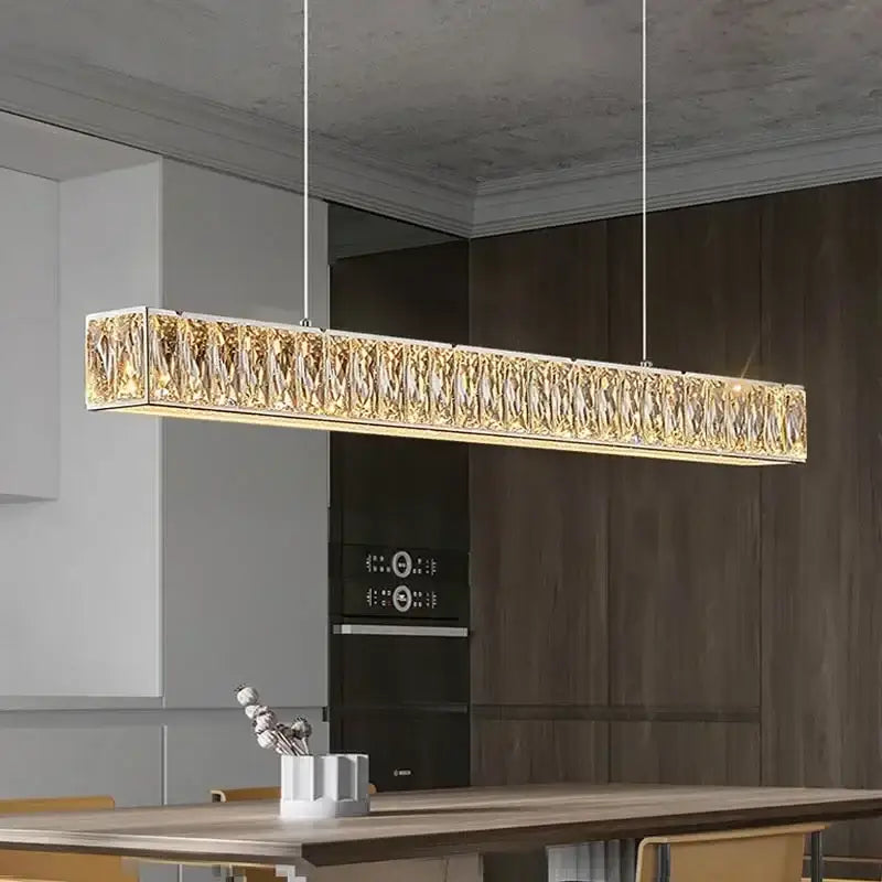 Golden led modern rectangular pendant light with textured crystal surface and sleek metallic frame for dining room decorbites golden led