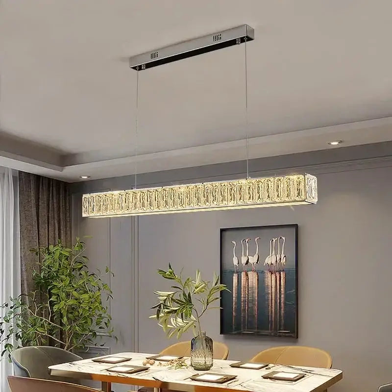 Modern rectangular pendant light with sleek silver frame and faceted crystals in decorbites golden led dining room lighting