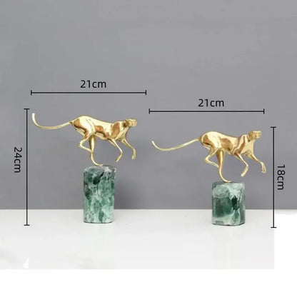 Two golden leopard brass figurines mounted on green marble bases perfect for living room decorbites decorbites golden leopard decor