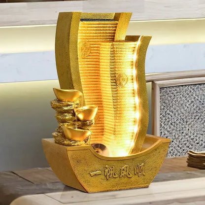 Golden metallic circulating water fountain shaped like a boat with stacked gold ingots and engraved Chinese characters for living room decorbites circulating water wealth decor