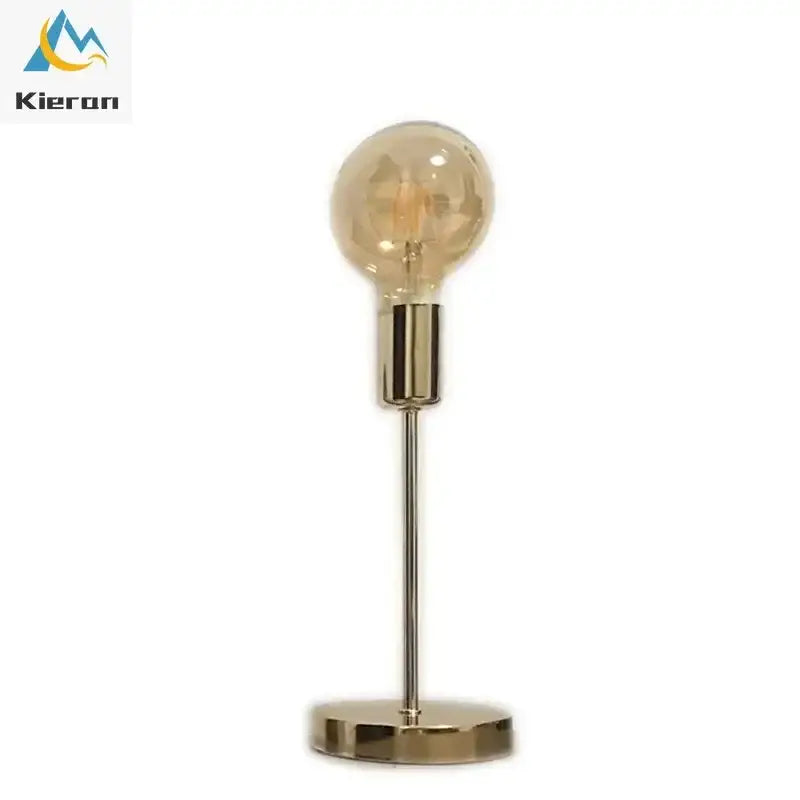 Golden modern led bedside lamp with gold finish and faceted amber textured glass bulb for bedroom lighting