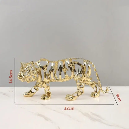 Golden openwork animal sculpture tiger figurine with intricate metallic design for living room decor by decorbites