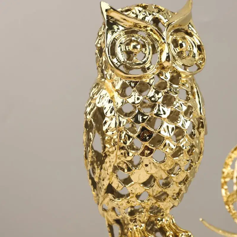 Golden openwork animal sculpture featuring a metallic intricate owl design for living room decorbites decor
