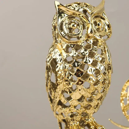 Golden openwork animal sculpture featuring a metallic intricate owl design for living room decorbites decor