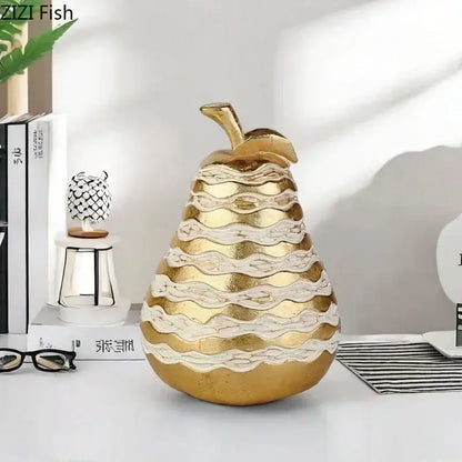 Golden pear-shaped decorative art statuette with layered white and gold patterns for desk decoration and living room use