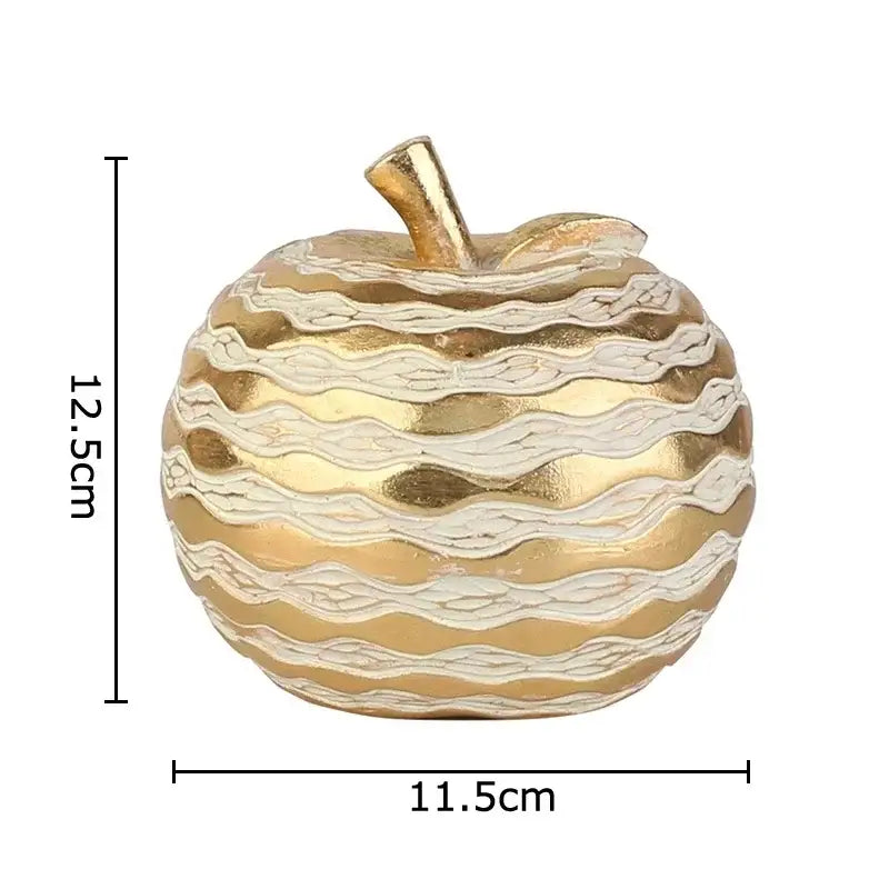 Decorative gold and cream striped apple figurine with textured wavy pattern for desk decoration art statuette