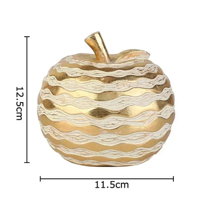 Decorative gold and cream striped apple figurine with textured wavy pattern for desk decoration art statuette